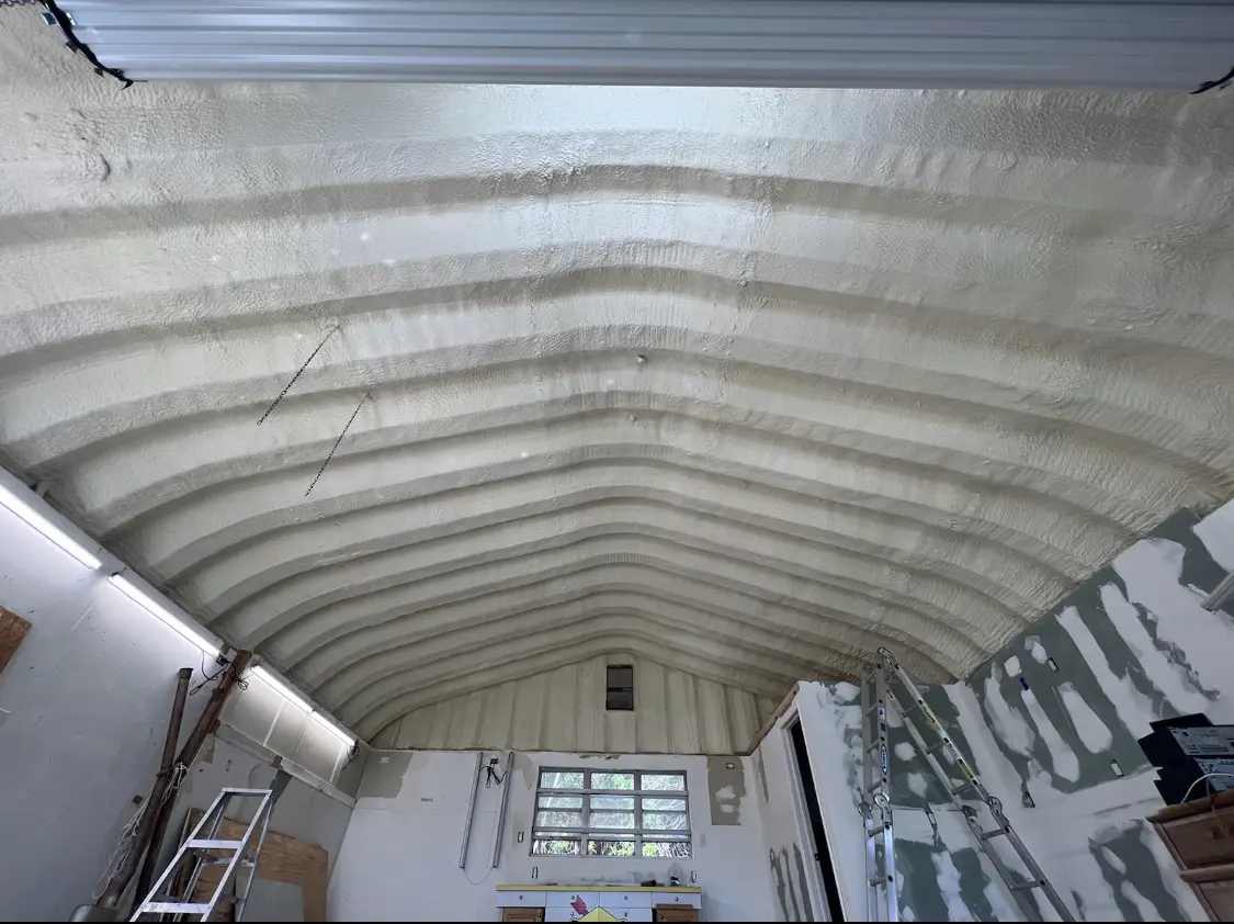 Spray polyurethane foam applied to the underside of a metal roof deck in Caernarvon